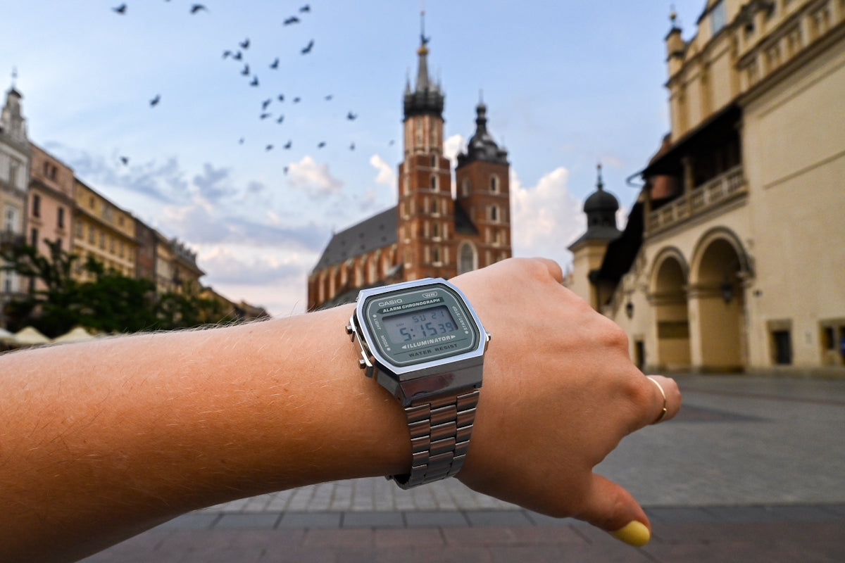 Digital watch in kraków's main square during morning.
